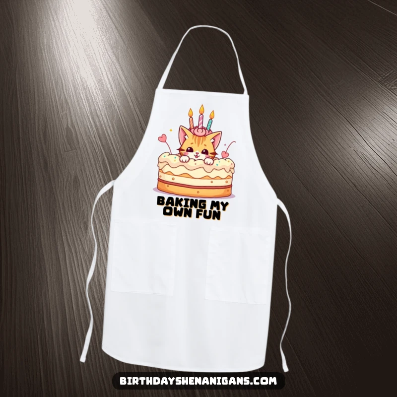 Funny apron featuring a playful cat character peeking from a giant birthday cake, perfect for a sweet kitchen adventure.