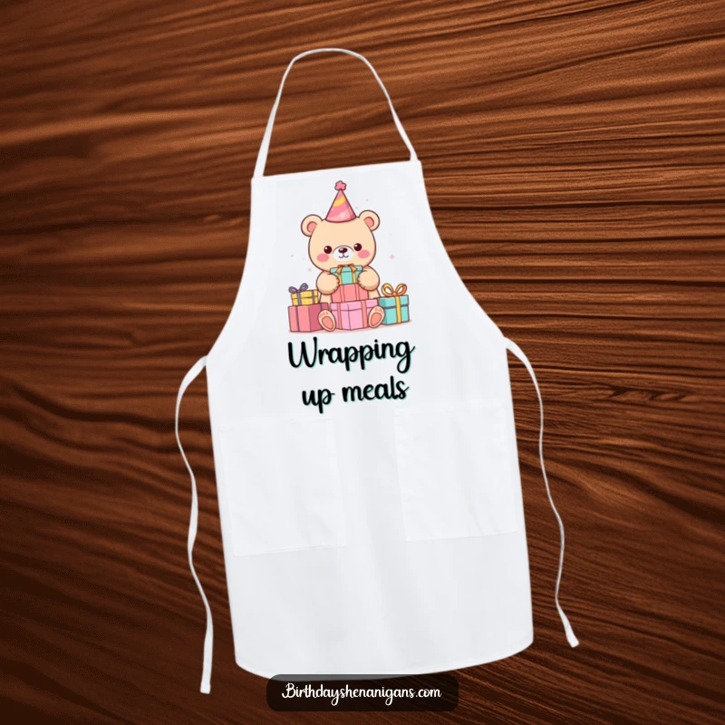 Funny kawaii bear wearing a party hat, stacking colorful presents on a kitchen apron, perfect for humorous cooking.