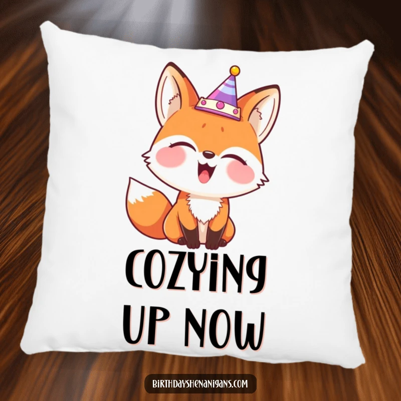 Funny pillow showcasing a giggling fox wearing a party crown askew, adding comfort and playful charm.