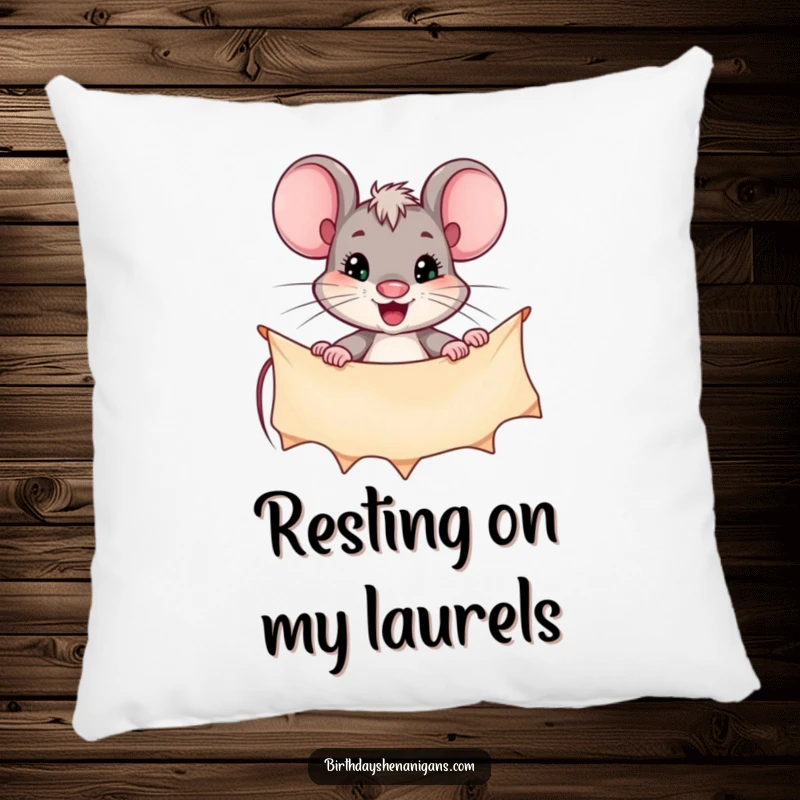 Funny pillow featuring a focused mouse character diligently hanging a banner, providing comfort and a reminder of ambition.