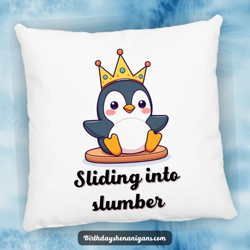 Funny kawaii penguin character sliding with a silly party crown on a soft pillow, offering comfort and a touch of playful charm.