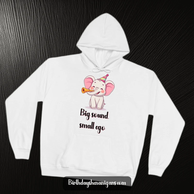 Funny hoodie showcasing a jubilant elephant blowing a party horn, radiating festive cheer and warmth.