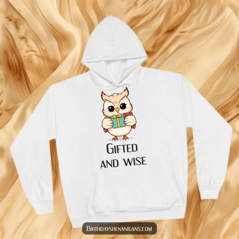 Funny owl character with a large stack of gifts, featured on a soft hoodie for ultimate cozy humor.