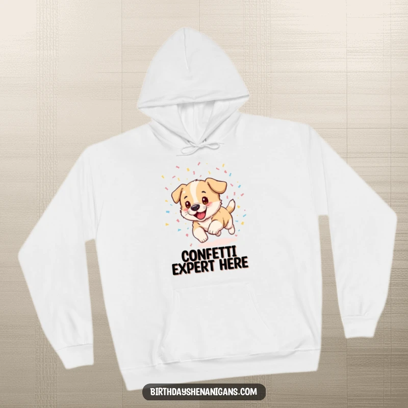 Funny puppy hoodie, cozy, excited, chasing confetti, celebration, warm whimsical design, humorous dog.