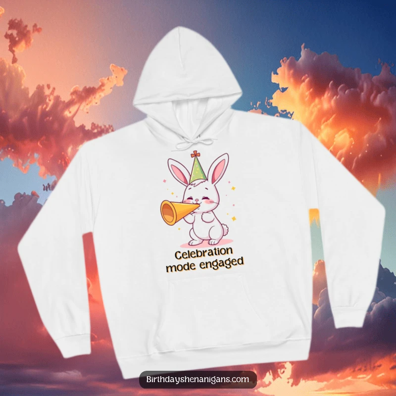 Funny hoodie showcasing a cute bunny in a party hat, enthusiastically blowing a massive party horn, embodying festive joy and celebration.