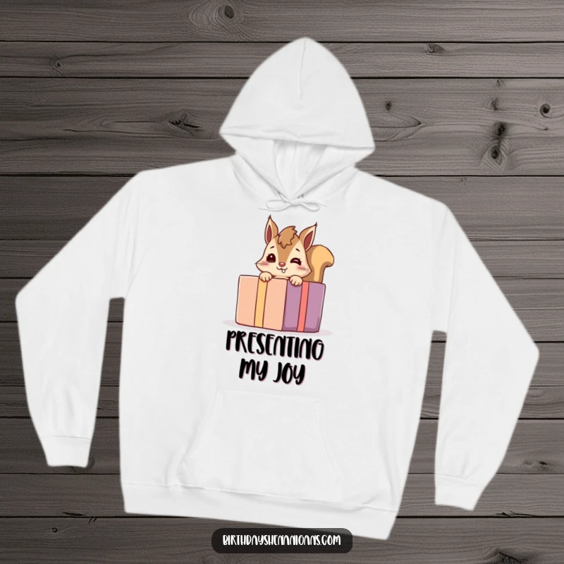 Funny giggling squirrel hoodie, a playful character peeking from behind a large present, designed for warmth, comfort, and giggles.