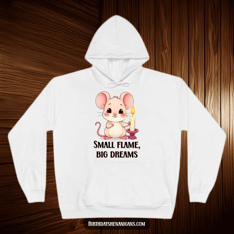 Funny kawaii mouse holding a lit candle with a curious expression on a cozy hoodie, radiating warmth.