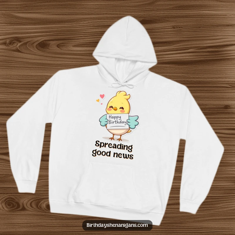 Funny whimsical bird character delivering a birthday card, cozy hoodie, perfect for staying warm and celebrating birthdays.