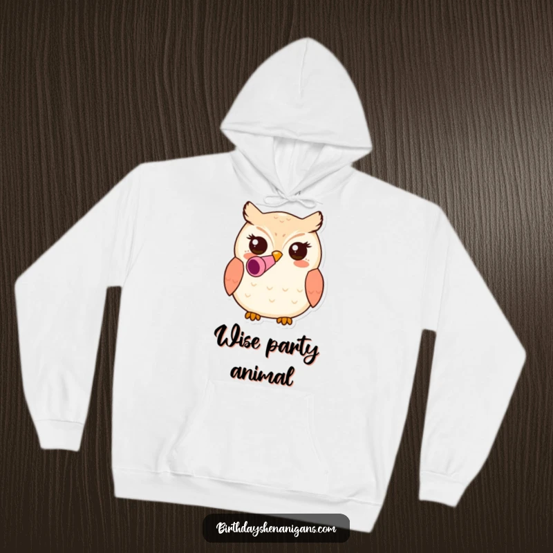 Funny kawaii owl character wearing a party blower in its beak on a cozy hoodie, offering warmth and a festive, whimsical spirit.