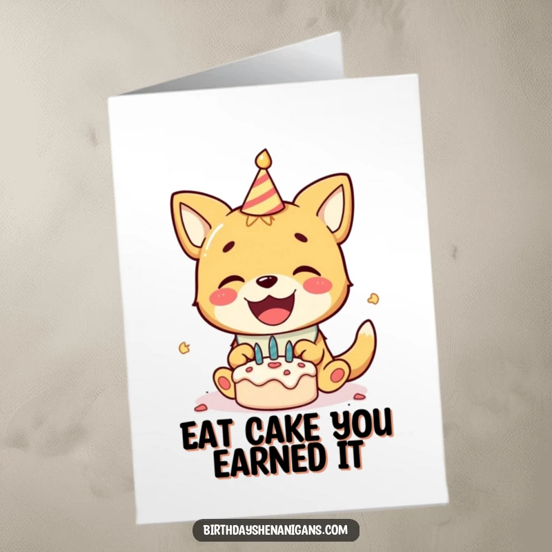 Funny free printable birthday card of a happy dog in a bib smashing a mini cake, ready to celebrate with glee.