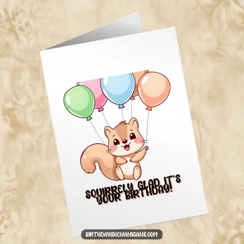 Funny Free Printable Birthday Card: A clumsy squirrel dangling precariously from balloon strings, ready for a hilarious celebration.