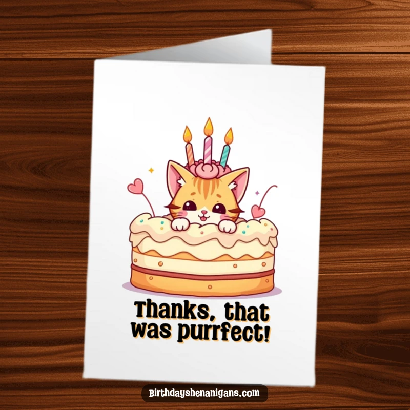 Funny Free Printable Thank You Card: A playful cat peeks from a cake, offering thanks with a cute and cheeky expression.