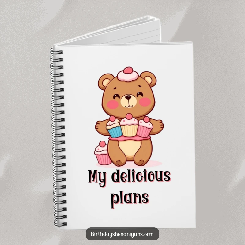 Funny notebook cover featuring a cheerful bear balancing a stack of cupcakes. Ideal for capturing sweet thoughts and bright ideas.