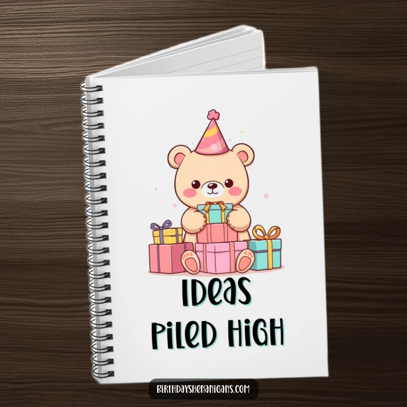 Funny kawaii bear in party hat stacking colorful presents on a notebook cover, ideal for humorous journaling.