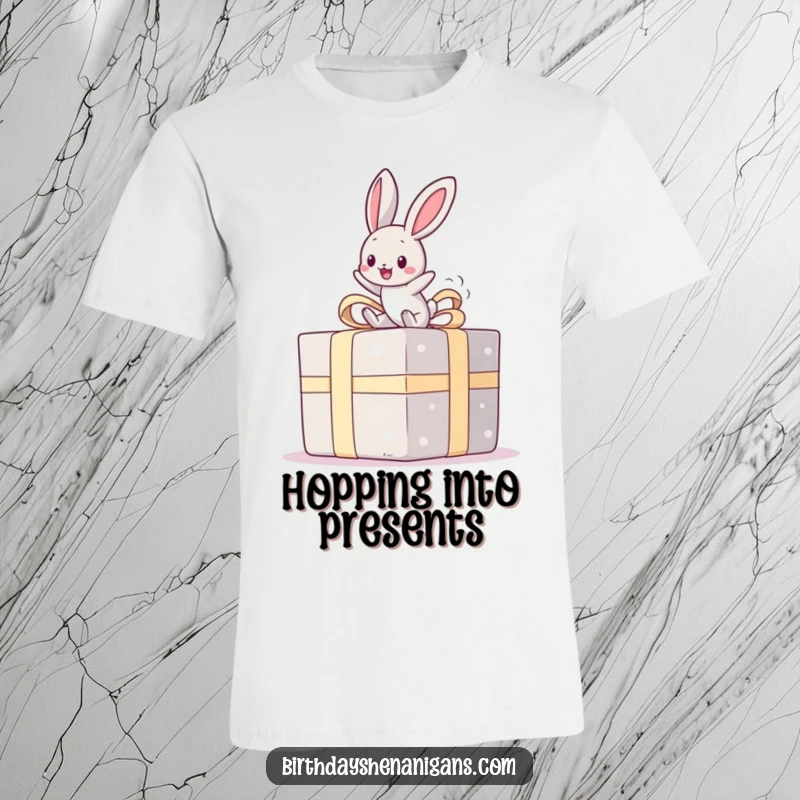 Funny t-shirt featuring a happy kawaii bunny bouncing on a giant present, perfect for celebrating joy and making a fun statement.