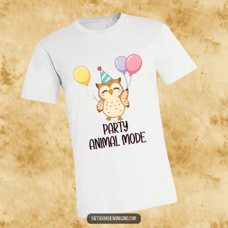 Funny Kawaii Owl T-Shirt: Adorable owl wearing a party hat joyfully juggles colorful balloons, a truly funny and festive sight.
