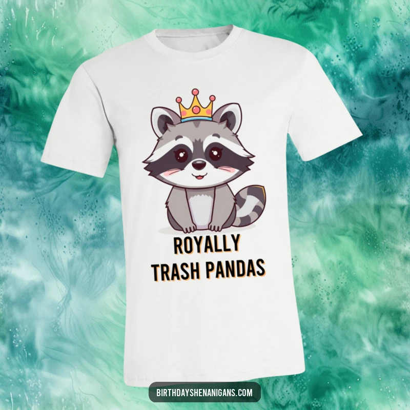 Funny raccoon t-shirt depicting a happy character wearing a festive crown, ready to lead the celebration.