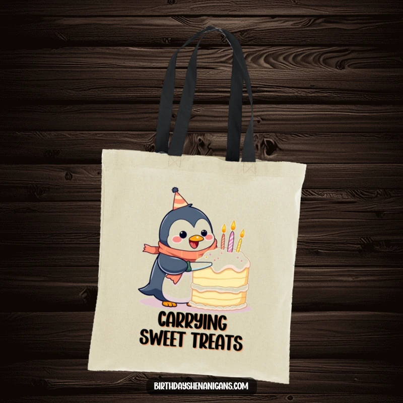 Funny tote bag showcasing a happy penguin wearing a birthday scarf, attempting to cut a giant cake, perfect for market trips.
